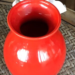May include: A set of three ceramic mugs with a speckled, matte finish. The mugs are in shades of cream, light gray, and dark gray. Each mug has a simple, minimalist design and a rounded handle.