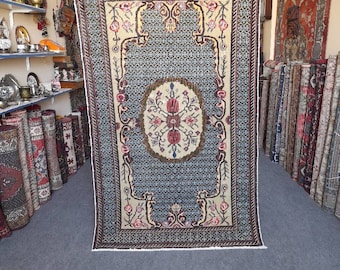 Alfombra Oushak vintage: 1,13 x 1,83 m, alfombra turca de lana anudada a mano.