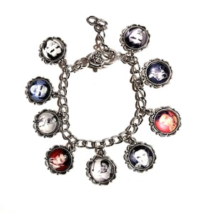 Gorgeous Photos of Elvis adorn this Antique Silver tone Charms & Stainless Steel Bracelet