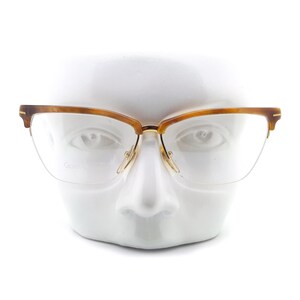 round gucci sunglasses with writing