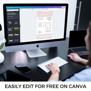 May include: A person is working on a computer with a blank invoice template open on the screen. The invoice template is designed in a minimalist style with a pink background and black text. The text "INVOICE" is at the top of the template. The person is using a keyboard and mouse to edit the template. The text "EASILY EDIT FOR FREE ON CANVA" is at the bottom of the image.