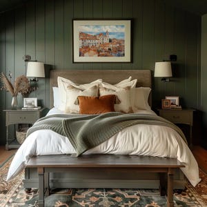 Lisbon_Alfama_watercolor_painting_above_the_bed_in_a_bedroom_with_green_shiplap_walls,_white_and_brown_bedding