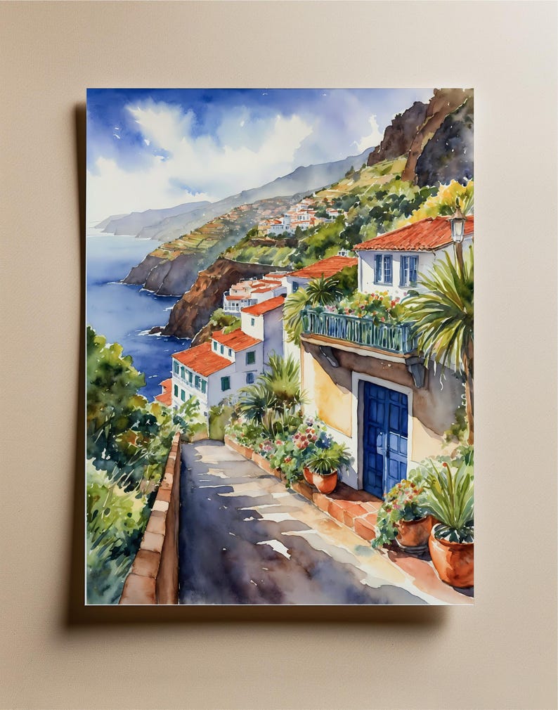 May include: A watercolor painting of a narrow, winding street in a coastal town. The street is lined with white houses with red tile roofs and lush green plants. The houses are built into a hillside overlooking the ocean. The sky is blue with white clouds.
