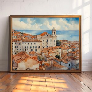 Lisbon_Alfama_watercolor_painting_in_light_wood_and_leaning_against_a_wall_on_an_empty_wooden_floor
