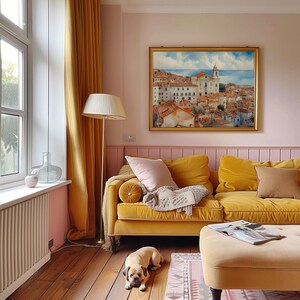 Lisbon_Alfama_watercolor_painting_in_gold_wooden_frame_on_the_wall_of_warm_tone_country_living_room_above_yellow_sofa
