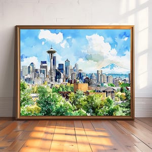 May include: Watercolor painting of the Seattle skyline, framed in a wooden frame. The artwork depicts the Space Needle, skyscrapers, and a mountain range under a blue sky with fluffy clouds. Green trees are in the foreground.