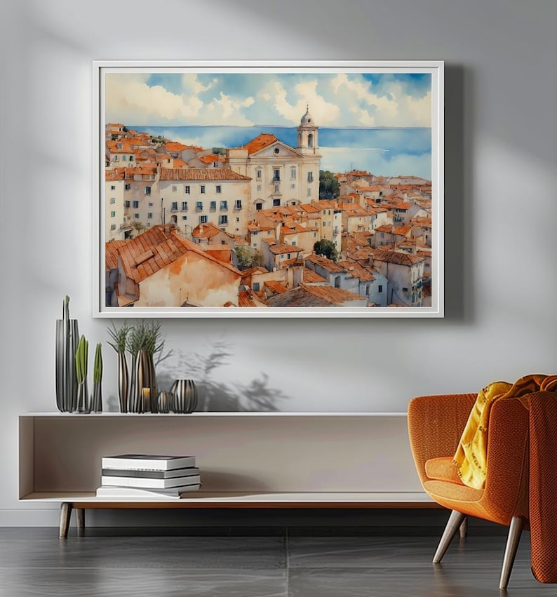 Lisbon_Alfama_watercolor_painting_hanging_on_the_wall_above_an_elegant_console_table_with_vases_and_books
