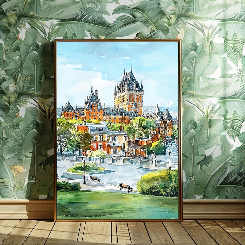 May include: A framed watercolor painting of a European-style castle with multiple towers and a red-orange facade. The artwork depicts a cityscape with buildings, trees, and a park with benches. The sky is blue, and the frame is gold.