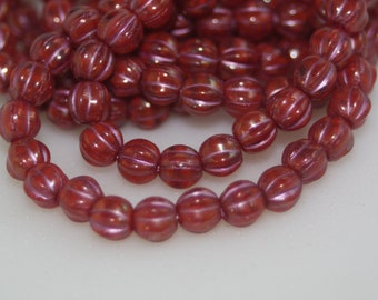 Perles de melon en verre tchèques 6 mm : lavage rose rouge, grand trou (25 perles)