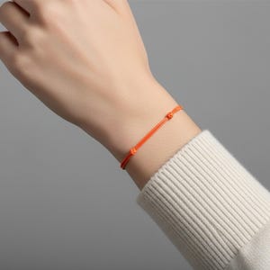 Fluorescerande orange vaxad bomullssnörearmband, miljövänliga orange buddhistiska smycken