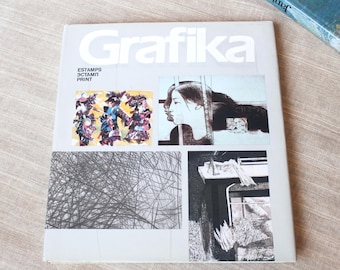 May include: A light gray book cover titled Grafika with the subtitle ESTAMPS, ЭСТАМП, PRINT. The cover features four distinct rectangular illustrations: a colorful abstract scene, a black and white profile portrait, a dense scribble pattern, and a black and white interior scene with a table.