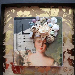 Small Assemblage Wall Art – Whimsical Portrait with Seashells & Buttons – Mixed Media in Black Frame with Beaded Handle