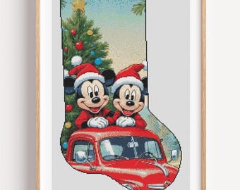 May include: Cross-stitch Christmas stocking featuring Mickey and Minnie Mouse in Santa hats, riding in a red vintage truck. A decorated Christmas tree with ornaments and a star is in the background. The stocking is framed.