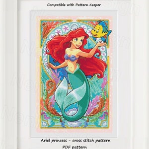May include: A cross stitch pattern featuring Ariel, the Little Mermaid, with her friend Flounder. The pattern is in a colourful art nouveau style with a pink, blue, and green colour scheme. The pattern is compatible with Pattern Keeper.