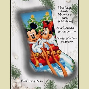 May include: A cross stitch pattern for a Christmas stocking featuring Mickey Mouse and Minnie Mouse sledding down a snowy hill with Christmas trees in the background. The pattern is titled "Mickey and Minnie are sledding - christmas stocking - cross stitch pattern".