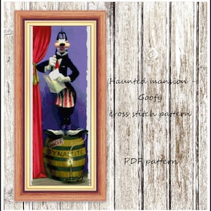 May include: Cross stitch pattern for a Haunted Mansion themed design featuring Goofy standing on a barrel labeled "Danger Dynamite".