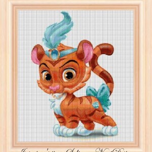 May include: A cross-stitch pattern featuring a cartoon tiger wearing a blue turban and a blue bow. The tiger is orange and black with a white face and blue eyes. The text "Jasmine's tiger Sultan - Neni Design" is at the bottom of the image.