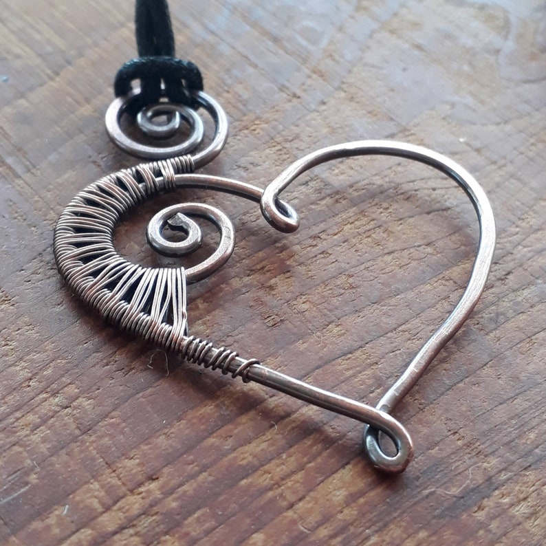 Oxidised copper wire wrapped heart and spiral pendant