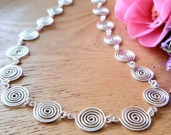 Alice Silver Spiral Necklaces in a Celtic style
