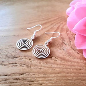 Silver spiral necklace, bracelet and earrings set in our open spiral design. Choose your silver grade - silver plate, sterling silver of fine silver. Choose your length and clasp type.