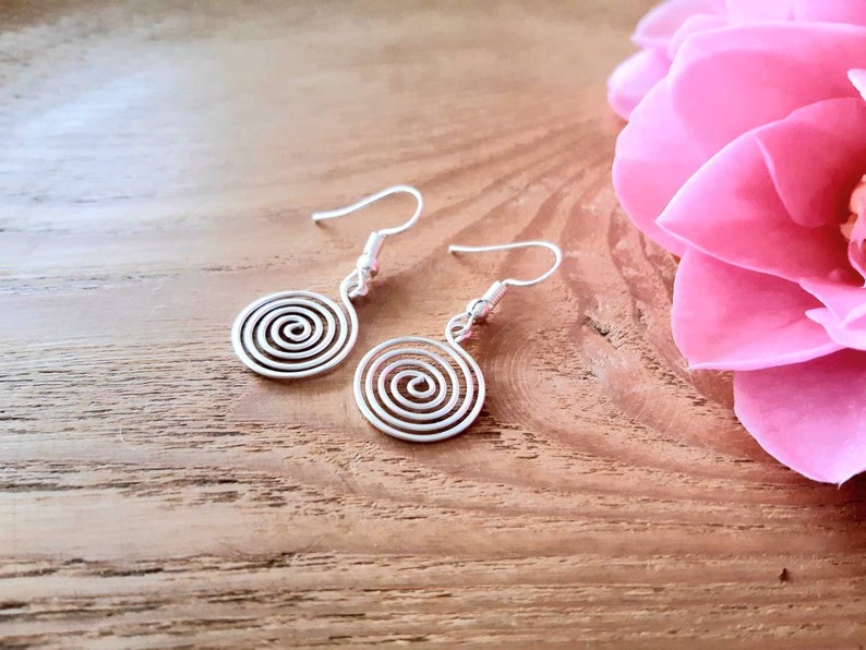 Silver spiral necklace, bracelet and earrings set in our open spiral design. Choose your silver grade - silver plate, sterling silver of fine silver. Choose your length and clasp type.
