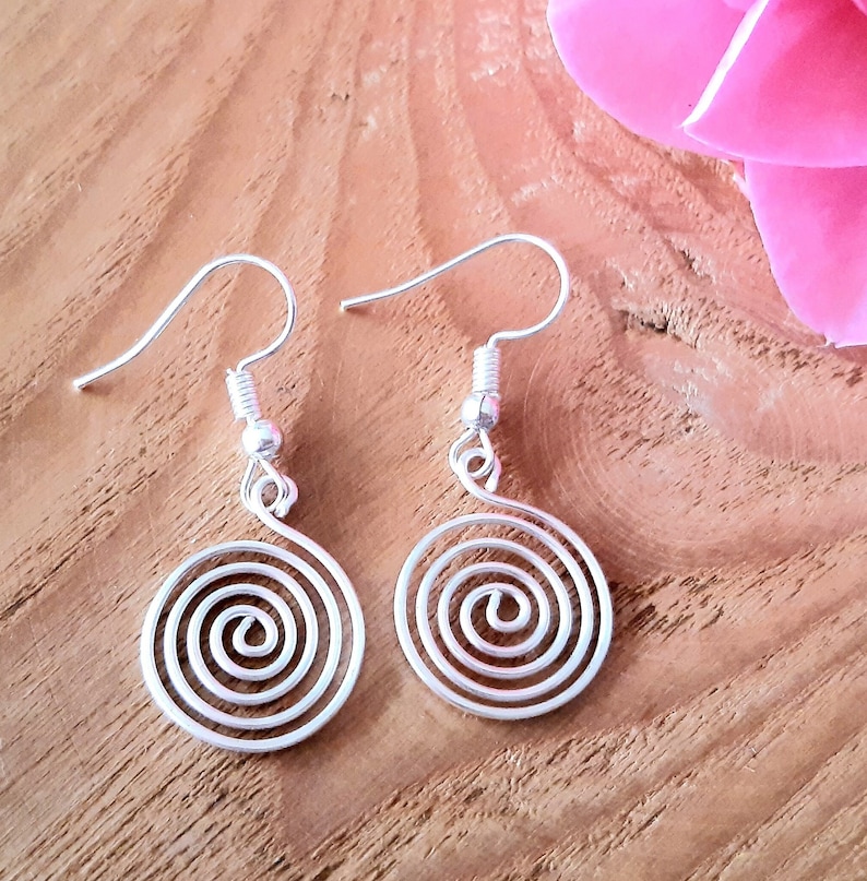Silver spiral earrings in our open spiral design. Made in a choice of silver grades - silver plate, sterling silver or fine silver.