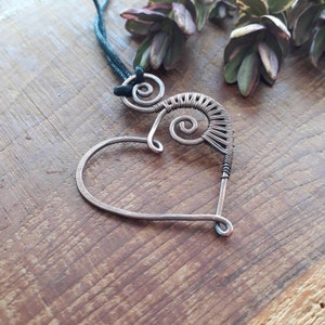 Oxidised copper wire wrapped heart and spiral pendant