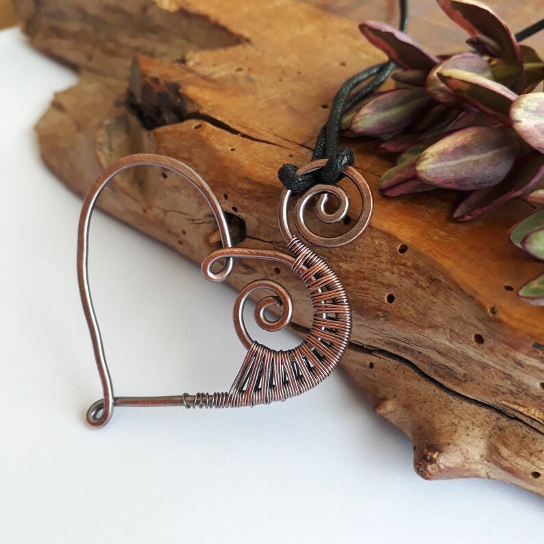 Oxidised copper wire wrapped heart and spiral pendant