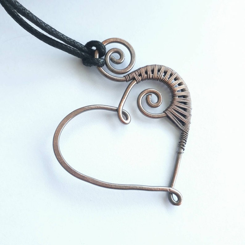 Oxidised copper wire wrapped heart and spiral pendant