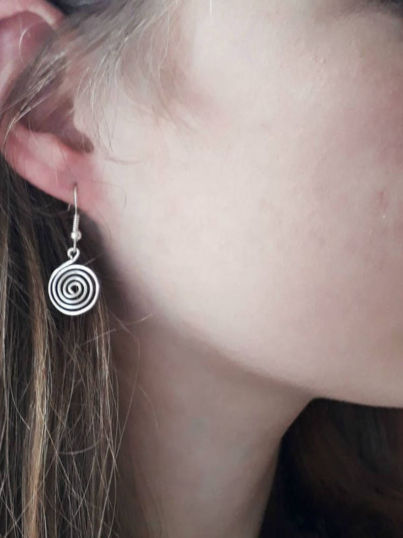 Silver spiral necklace, bracelet and earrings set in our open spiral design. Choose your silver grade - silver plate, sterling silver of fine silver. Choose your length and clasp type.