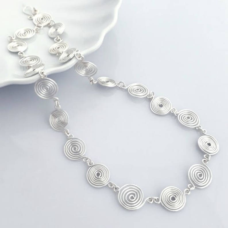 Silver spiral Celtic necklace and earring set