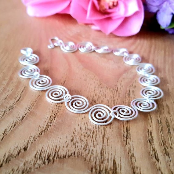 Silver 2024 spiral bracelet