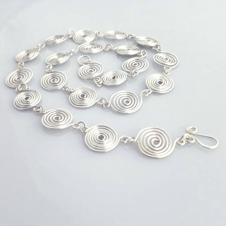 Silver spiral Celtic necklace and earring set
