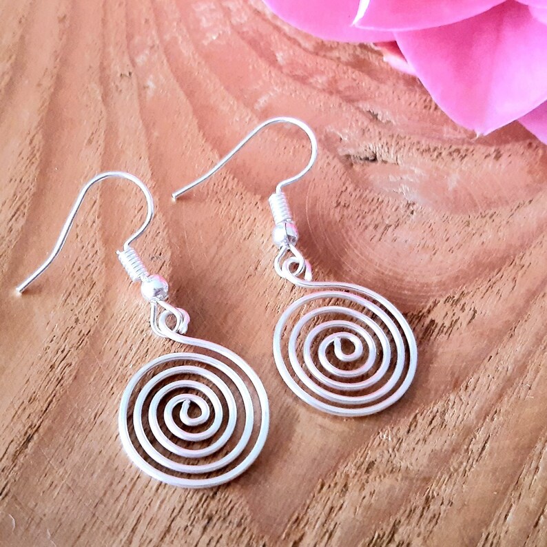 Silver spiral earrings in our open spiral design. Made in a choice of silver grades - silver plate, sterling silver or fine silver.