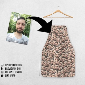 May include: A white apron featuring a repeated pattern of a person's face, hanging on a wooden hanger. A photo of the person is shown next to the apron. The apron is made of polyester satin.
