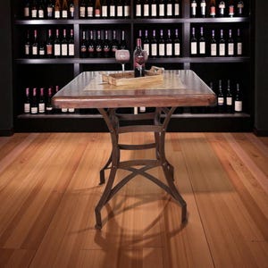 May include: A square, dark wood table with a metal base, holding a bottle of red wine and a glass. The table is set in front of a wall of wine bottles. The table is approximately 36 inches long and wide.