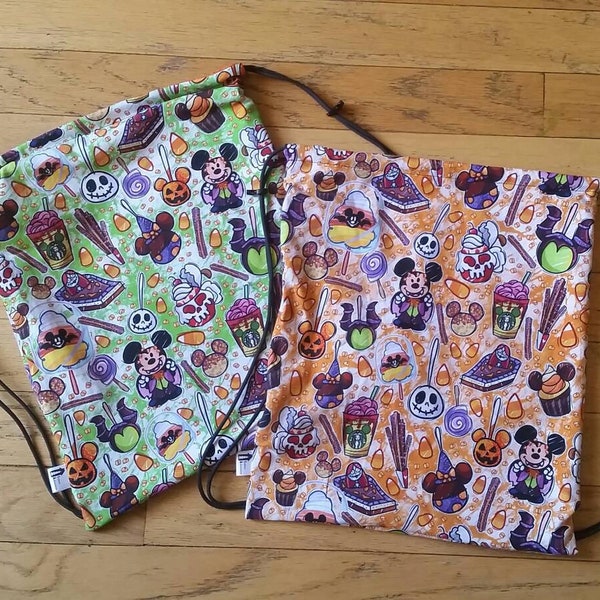 Sac à dos à cordon de serrage Tricky Treats en orange ou vert