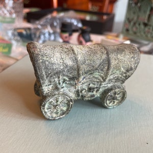 Old cast iron toy covered wagon