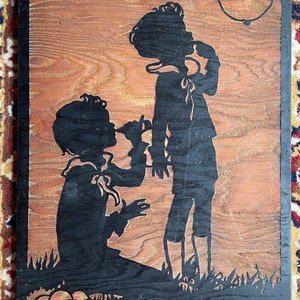 Vintage/antique hand-carved and painted relief silhouettes on wood