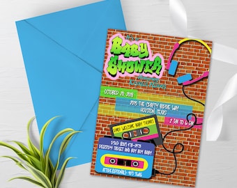 May include: A baby shower invitation with a 90s theme. The invitation features a brick wall background with graffiti-style text that says "It's a Baby Shower". There are cassette tapes and headphones on the invitation. The text on the invitation says "October 20, 2018, 2075 The Crafty Birdie Way, Houston, Texas, 2 PM to 6 PM, Mix Welcome Baby Thomas, PSVD (832) 478-2973, Registry Target and Buy Buy Baby, Attire Optional: 90's Swag".