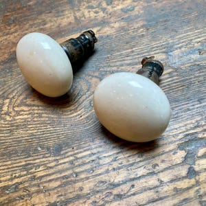White Porcelain Door Knobs with Specialized Shanks.  Antique.
