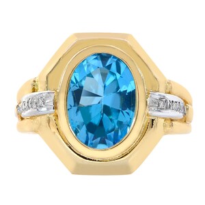 Blue Topaz And Diamond Accent Ring 14K Yellow Gold