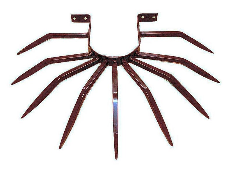 May include: A dark brown metal garden tool with multiple tines, designed for cultivating soil. The tool has a U-shaped frame with two vertical supports and a circular base.