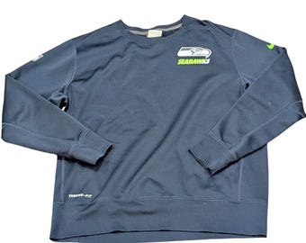 Sudadera Nike Therma-FIT Seattle Seahawks NFL Onfield con cuello redondo para hombre, talla XL, color azul marino.