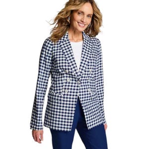 May include: A double-breasted blazer in a navy and white gingham pattern. The blazer has a classic design with white buttons and a tailored fit. The jacket is paired with navy blue pants.