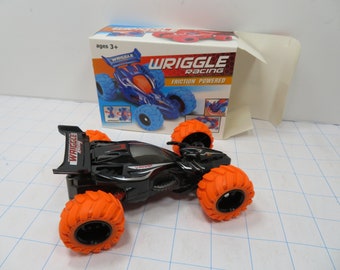MH 442 Wriggle Racing Friction Powered Car Black Brand New