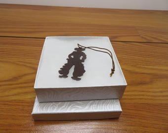 T 857 Metal Cowboy Wearing Chaps - 1990 - Hang From Car/Truck Mirror Or As A Ornament - Brand New Old Stock