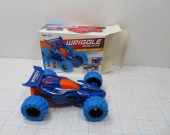 MH 443 Wriggle Racing Friction Powered Car Blue Brand New