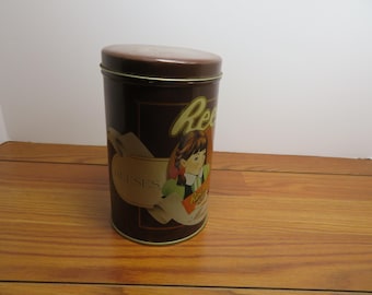 T 705 Vintage Reese's 1989 Miniature's Candy Tin With The Reese's Story On Back Of Can - Excellent Condition & Very Clean Inside/Out