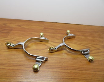 T 91 Ladies Weaver Roping Spurs (10) Point Rowell, 1 3/4" Shank 1/2" Band Stainless Steel New Old Stock